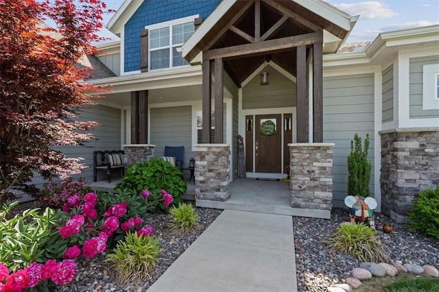 30307 Woodland Dr, Pleasant Hill, MO 64080 - property entrance featuring covered porch and stone siding