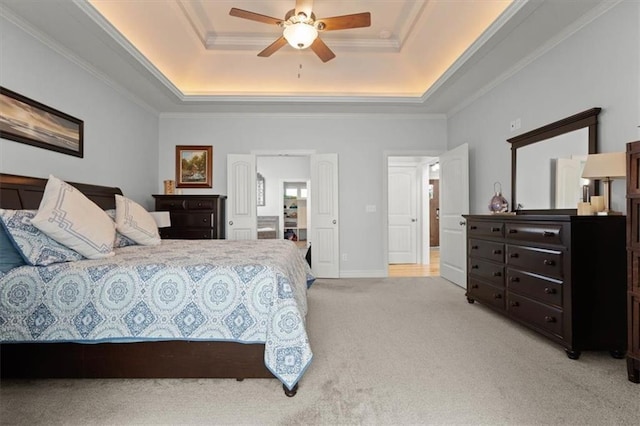 30307 Woodland Dr, Pleasant Hill, MO 64080 - bedroom featuring a tray ceiling, light carpet, crown molding, and ceiling fan