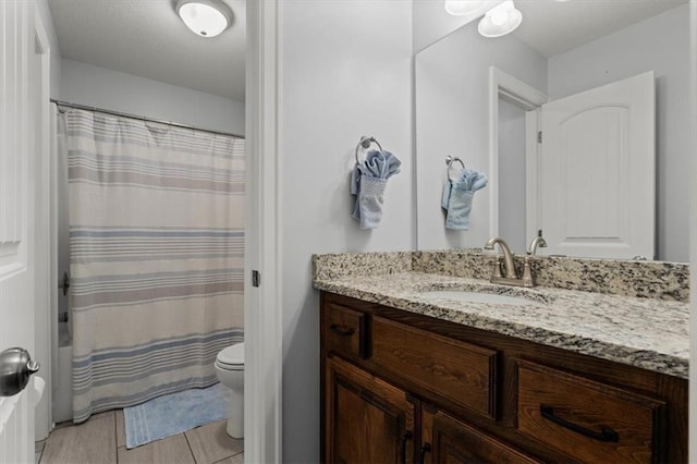 30307 Woodland Dr, Pleasant Hill, MO 64080 - full bath featuring toilet, vanity, and a shower with curtain