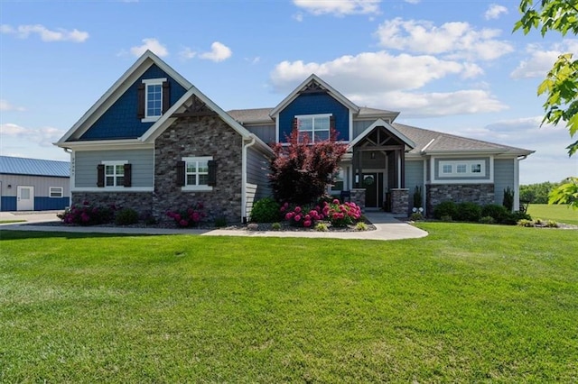 30307 Woodland Dr, Pleasant Hill, MO 64080 - craftsman-style home with stone siding and a front lawn