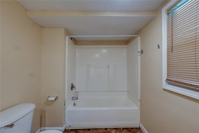 10101 E 18th St, Independence, MO 64052 - full bathroom featuring toilet, baseboards, and washtub / shower combination
