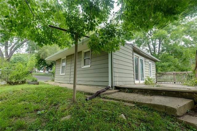 10101 E 18th St, Independence, MO 64052 - view of home's exterior featuring a wooden deck