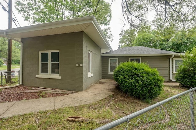 10101 E 18th St, Independence, MO 64052 - view of home's exterior with concrete block siding