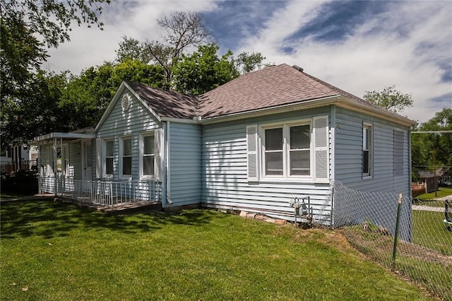view of front of property with a shingled roof