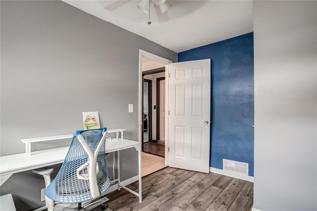 office with ceiling fan, wood finished floors, and baseboards