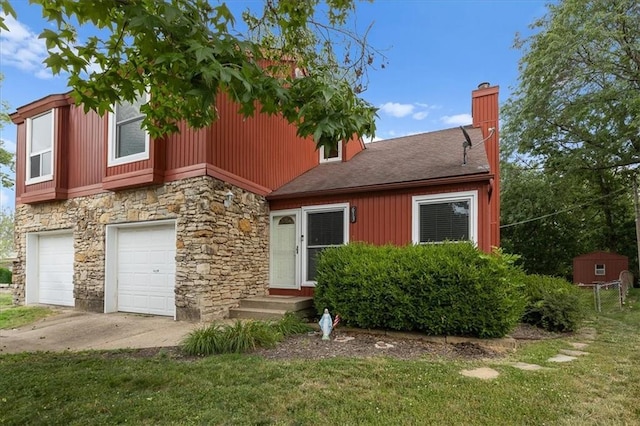 613 NE 90th Ter, Kansas City, MO 64155 - view of front of house featuring stone siding, a chimney, a garage, a front yard, and concrete driveway