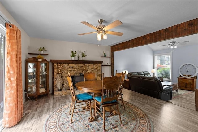 613 NE 90th Ter, Kansas City, MO 64155 - dining area featuring a ceiling fan and wood finished floors