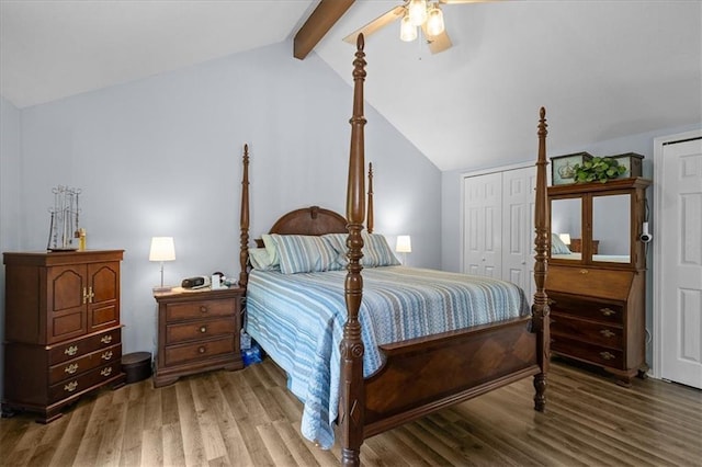 613 NE 90th Ter, Kansas City, MO 64155 - bedroom with wood finished floors, a ceiling fan, and two closets