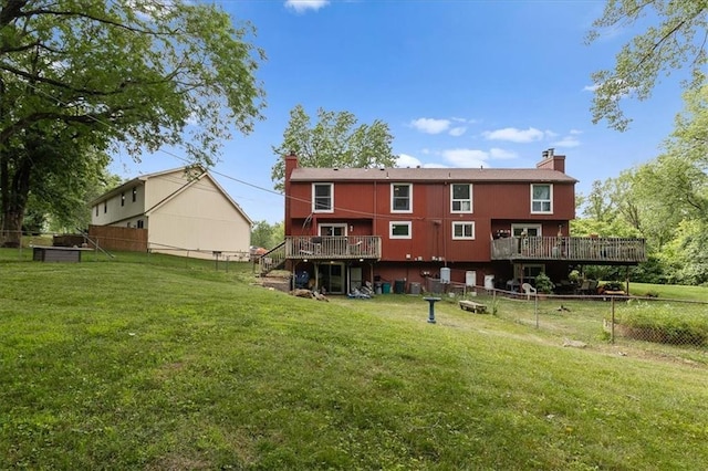 613 NE 90th Ter, Kansas City, MO 64155 - rear view of house featuring a chimney, a deck, and stairway