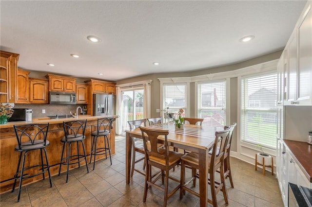 803 Crestridge Dr, Kearney, MO 64060 - dining area featuring light tile patterned floors and recessed lighting