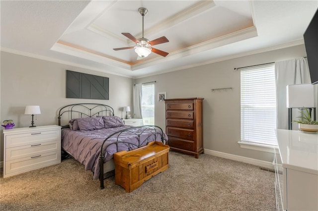 803 Crestridge Dr, Kearney, MO 64060 - bedroom featuring a tray ceiling, crown molding, light carpet, and a ceiling fan