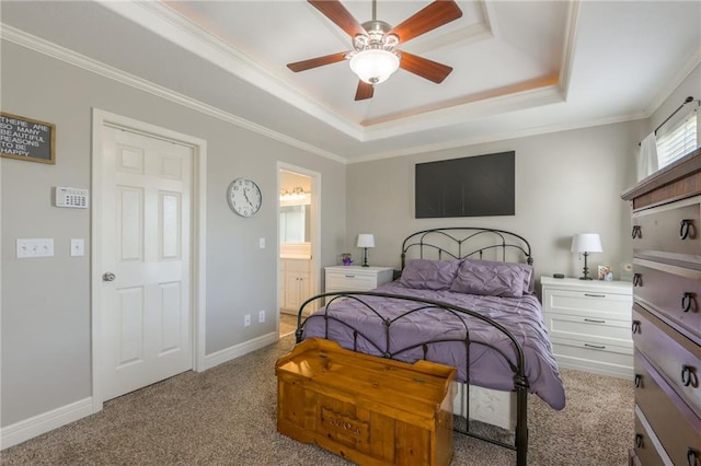 803 Crestridge Dr, Kearney, MO 64060 - carpeted bedroom with a tray ceiling, ornamental molding, ceiling fan, and ensuite bathroom