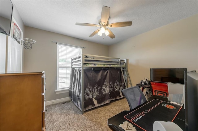 803 Crestridge Dr, Kearney, MO 64060 - bedroom featuring carpet flooring, a ceiling fan, and a textured ceiling