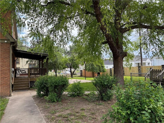 2702 Faraon St, Saint Joseph, MO 64501 - view of yard featuring a wooden deck