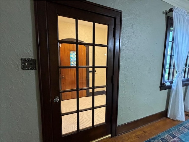 2702 Faraon St, Saint Joseph, MO 64501 - detailed view of a textured wall, wood finished floors, and baseboards