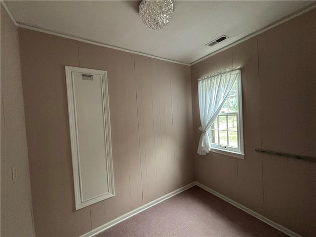 2702 Faraon St, Saint Joseph, MO 64501 - carpeted spare room featuring ornamental molding and baseboards