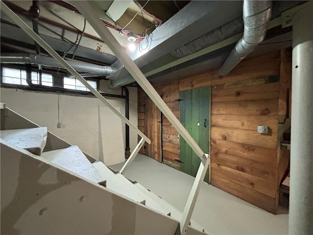 2702 Faraon St, Saint Joseph, MO 64501 - basement with wooden walls and stairs