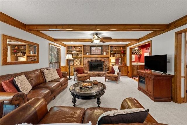 12224 Connell Dr, Overland Park, KS 66213 - carpeted living area with a fireplace, ceiling fan, beamed ceiling, built in features, and a textured ceiling
