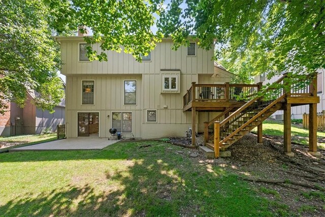12224 Connell Dr, Overland Park, KS 66213 - back of house with stairs, a patio, and a deck