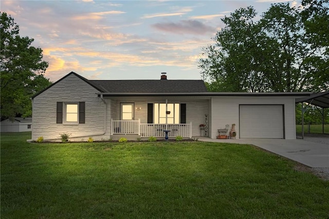 13223 Gammon Rd, Lees Summit, MO 64086 - single story home featuring covered porch, an attached garage, a lawn, stone siding, and concrete driveway