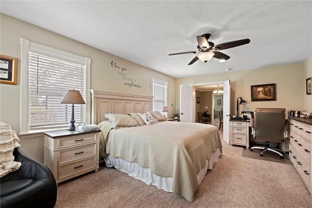 13223 Gammon Rd, Lees Summit, MO 64086 - bedroom with light colored carpet, an office area, a textured ceiling, and a ceiling fan