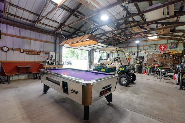 13223 Gammon Rd, Lees Summit, MO 64086 - rec room featuring pool table, concrete floors, a garage, vaulted ceiling, and metal wall