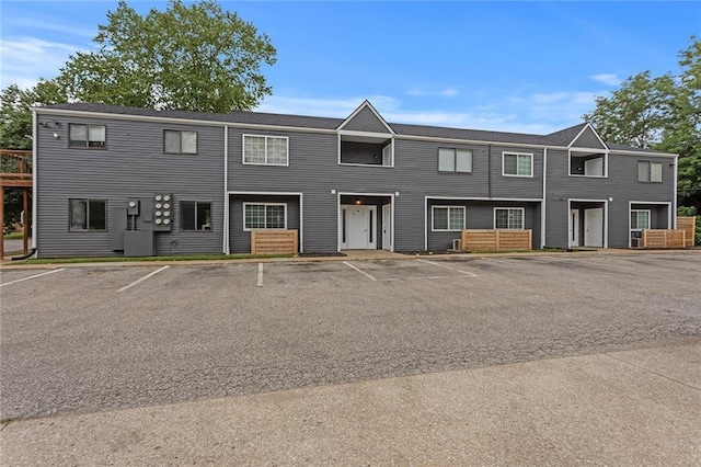 1506 W 25th Ct Unit E5, Lawrence, KS 66046 - view of front of property with uncovered parking