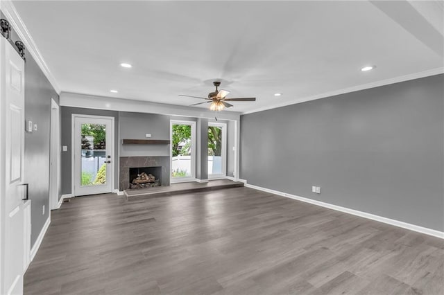 6531 W 49th St, Mission, KS 66202 - unfurnished living room featuring recessed lighting, a ceiling fan, baseboards, crown molding, and dark wood-style floors