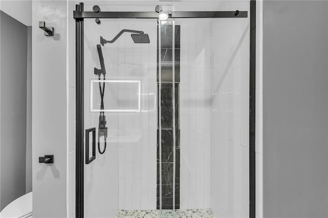 6531 W 49th St, Mission, KS 66202 - bathroom featuring a stall shower and toilet