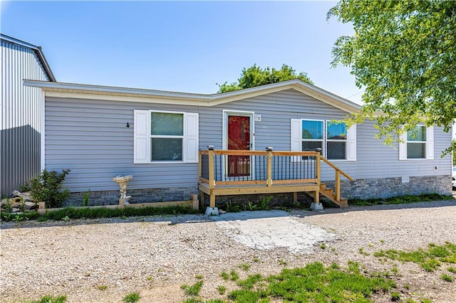 549 N Linn Valley Dr, Linn Valley, KS 66040 - manufactured / mobile home featuring a wooden deck