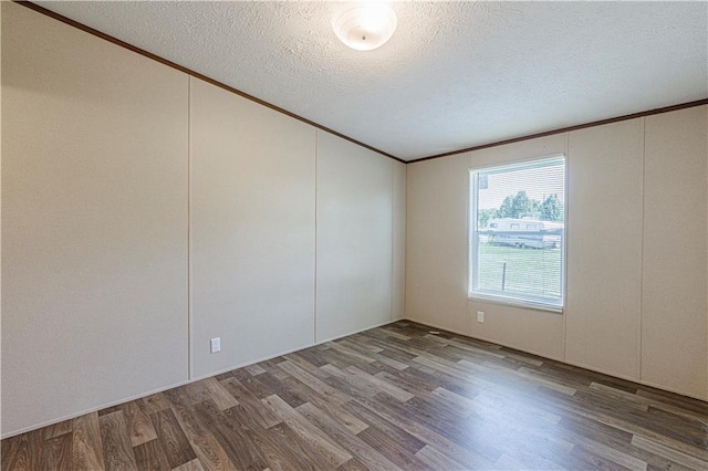 549 N Linn Valley Dr, Linn Valley, KS 66040 - empty room featuring ornamental molding, wood finished floors, and a textured ceiling