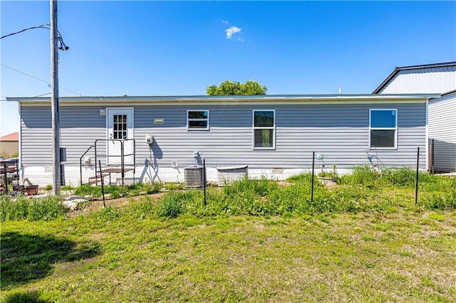 549 N Linn Valley Dr, Linn Valley, KS 66040 - rear view of property featuring cooling unit