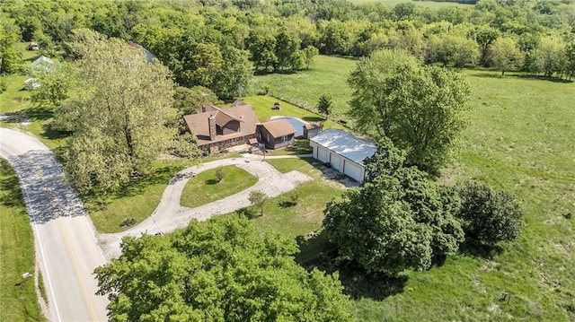view from above of property featuring a forest