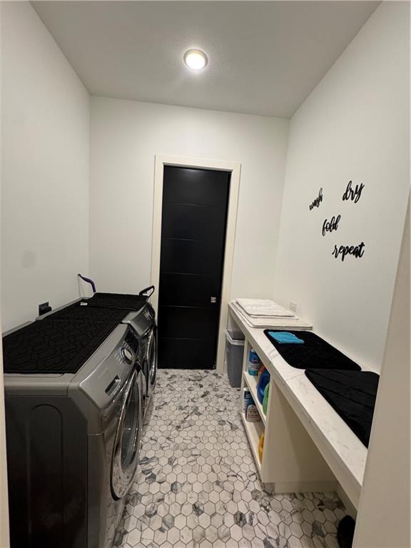 8890 Mccoy St, Lenexa, KS 66227 - laundry area with independent washer and dryer