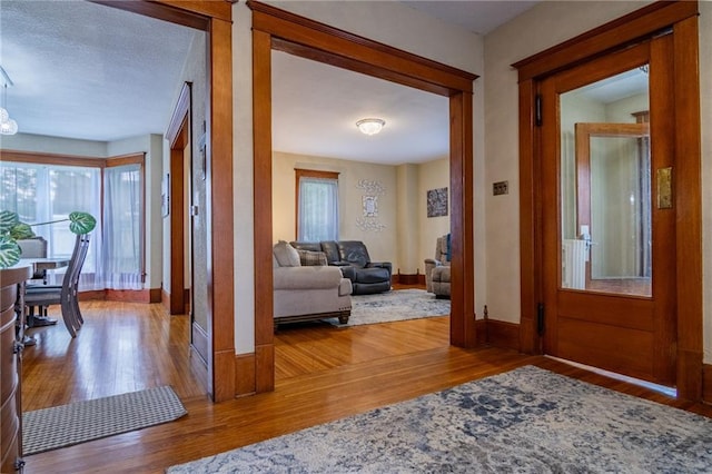 203 S Hughes St, Hamilton, MO 64644 - foyer featuring wood finished floors