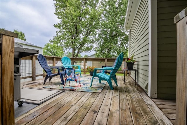 203 S Hughes St, Hamilton, MO 64644 - view of wooden deck