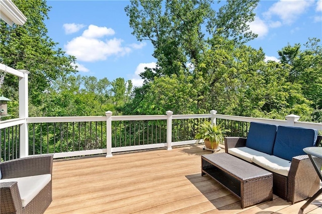 wooden deck with an outdoor hangout area