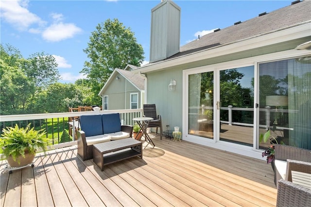 deck with an outdoor hangout area
