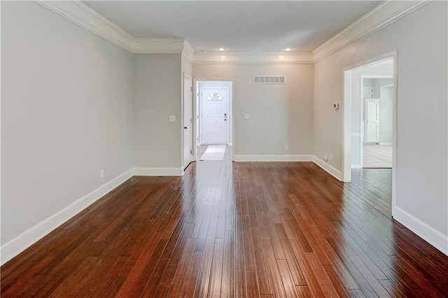 1205 SW 20th St, Blue Springs, MO 64015 - spare room with dark wood-type flooring, ornamental molding, baseboards, and recessed lighting