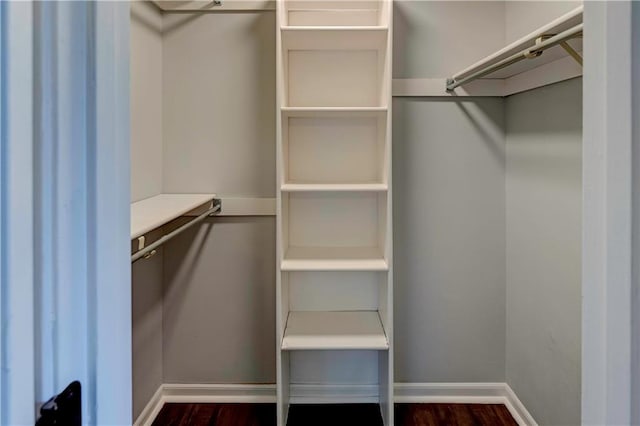 1205 SW 20th St, Blue Springs, MO 64015 - walk in closet featuring dark wood-style floors