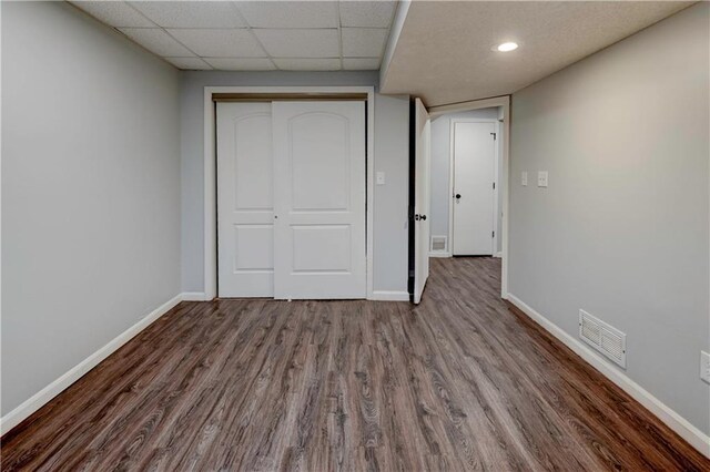 1205 SW 20th St, Blue Springs, MO 64015 - unfurnished bedroom with wood finished floors, baseboards, and a closet