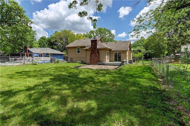 1205 SW 20th St, Blue Springs, MO 64015 - back of house with a patio