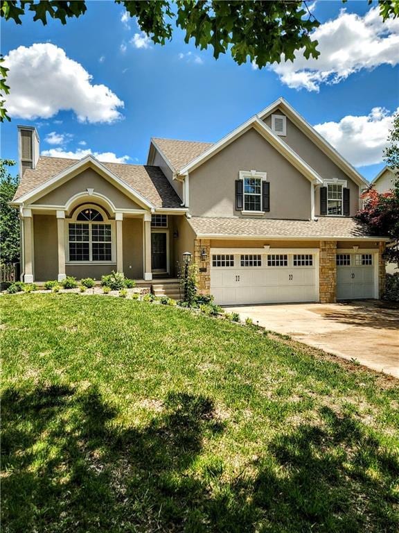 view of front of home with stucco siding, concrete driveway, an attached garage, a chimney, and a front yard