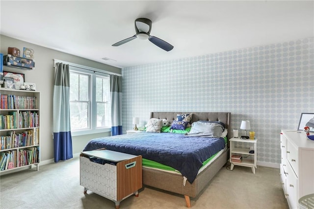 2807 W 50th Ter, Westwood, KS 66205 - bedroom featuring light colored carpet, baseboards, wallpapered walls, and a ceiling fan