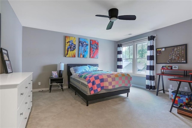 2807 W 50th Ter, Westwood, KS 66205 - bedroom with light carpet, baseboards, and ceiling fan
