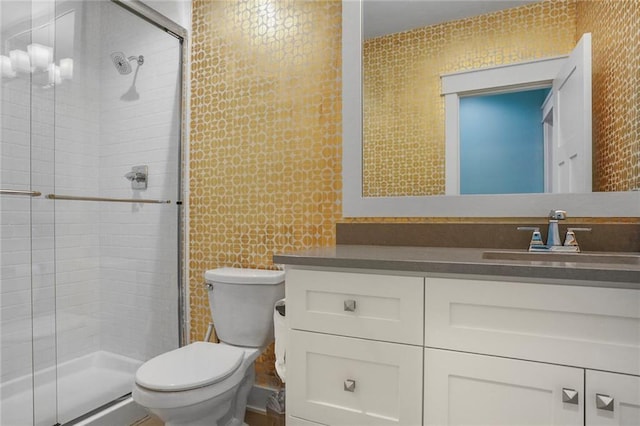 2807 W 50th Ter, Westwood, KS 66205 - bathroom with toilet, vanity, and a stall shower