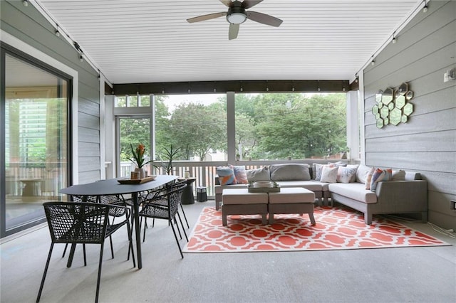 2807 W 50th Ter, Westwood, KS 66205 - sunroom / solarium with an outdoor hangout area, a ceiling fan, and outdoor dining space