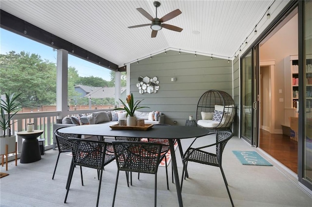 2807 W 50th Ter, Westwood, KS 66205 - sunroom featuring ceiling fan, lofted ceiling, and outdoor dining space