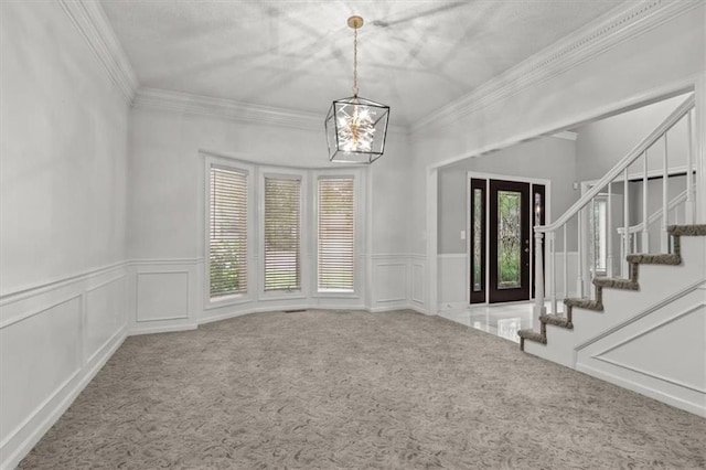 8407 W 141st St, Overland Park, KS 66223 - unfurnished dining area with a chandelier, carpet, crown molding, a wainscoted wall, and stairway