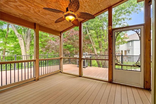 8407 W 141st St, Overland Park, KS 66223 - unfurnished sunroom featuring ceiling fan